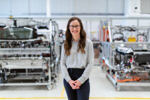 woman engineer walking on factory floor